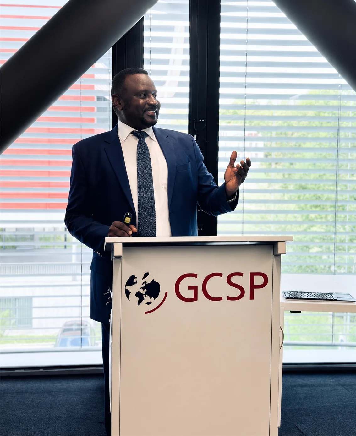Ismael Hagana speaking at GCSP — global humanitarian and governance engagement
